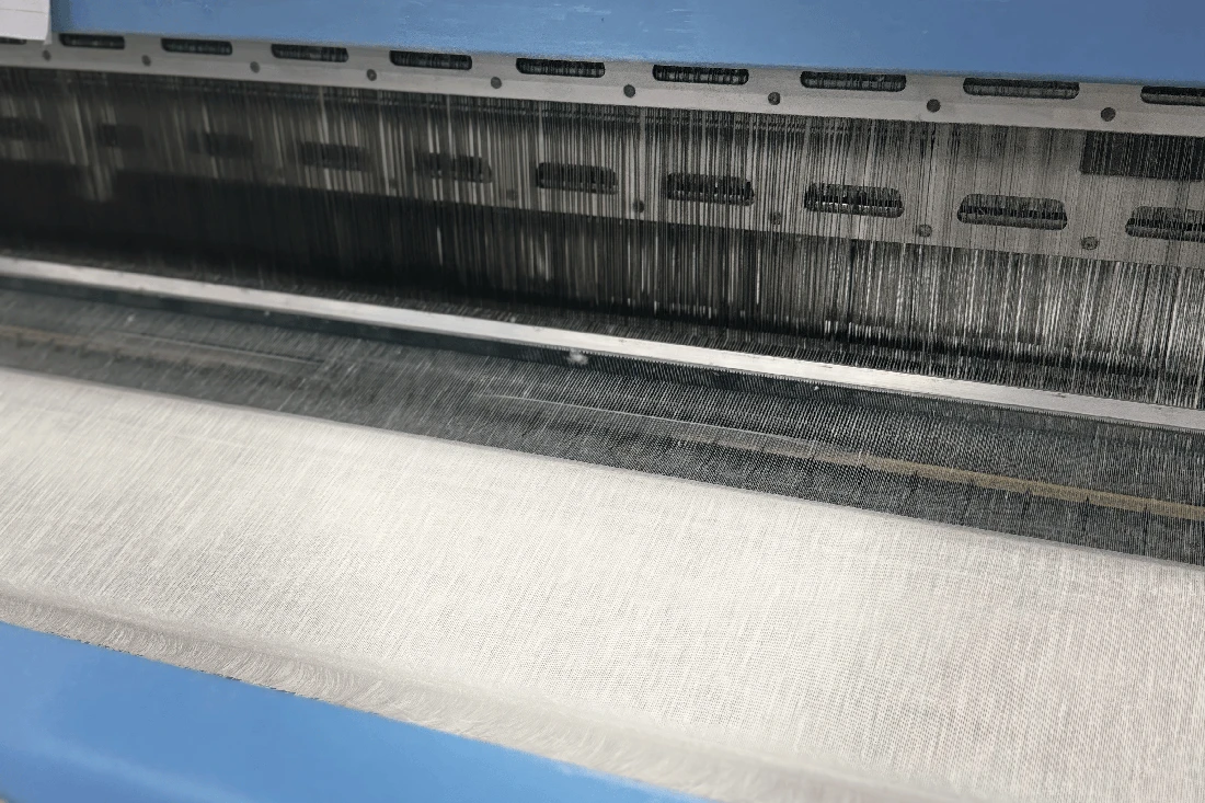 Close-up of natural linen thread on spinning bobbin
